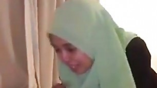Maylasian hijabi slutgirl exposed in sextape giving blowjob and fucking her boyfriend